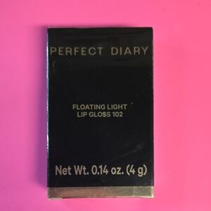 Floating Light Lip Gloss Shade 102 Peach Pomelo Tea- Black and Gold